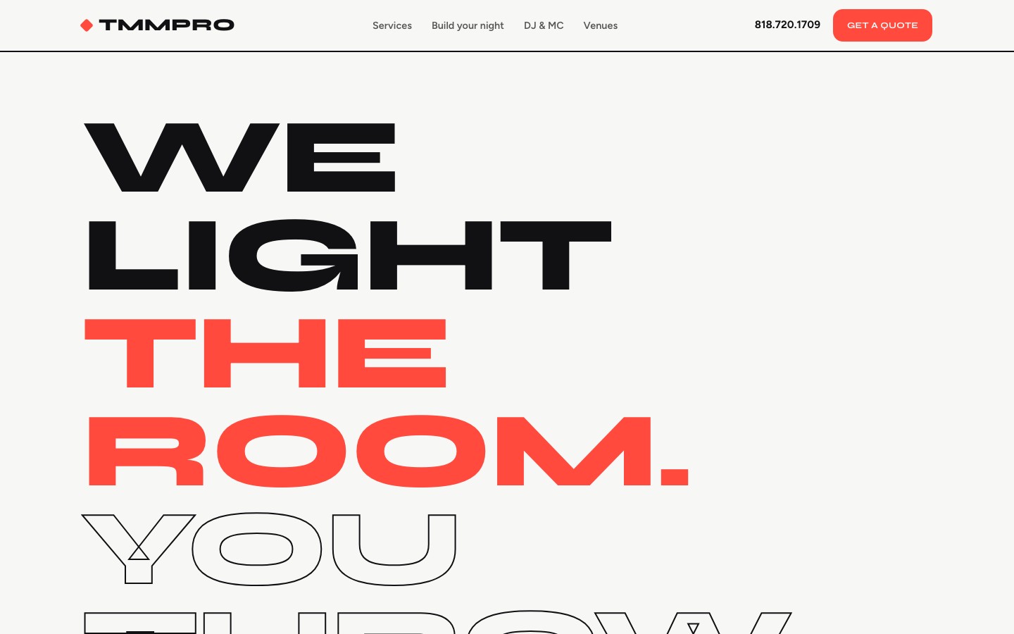 TMM Productions website hero section showing bold Syne typography and stage-lighting color palette